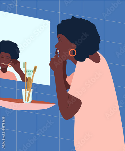 Young afroamerican woman brushes her teeth with dental floss in the bathroom.Dental and orthodontic daily life concept.Oral care.Healthy smile.Black girl getting ready for the bed.Vector for clinic