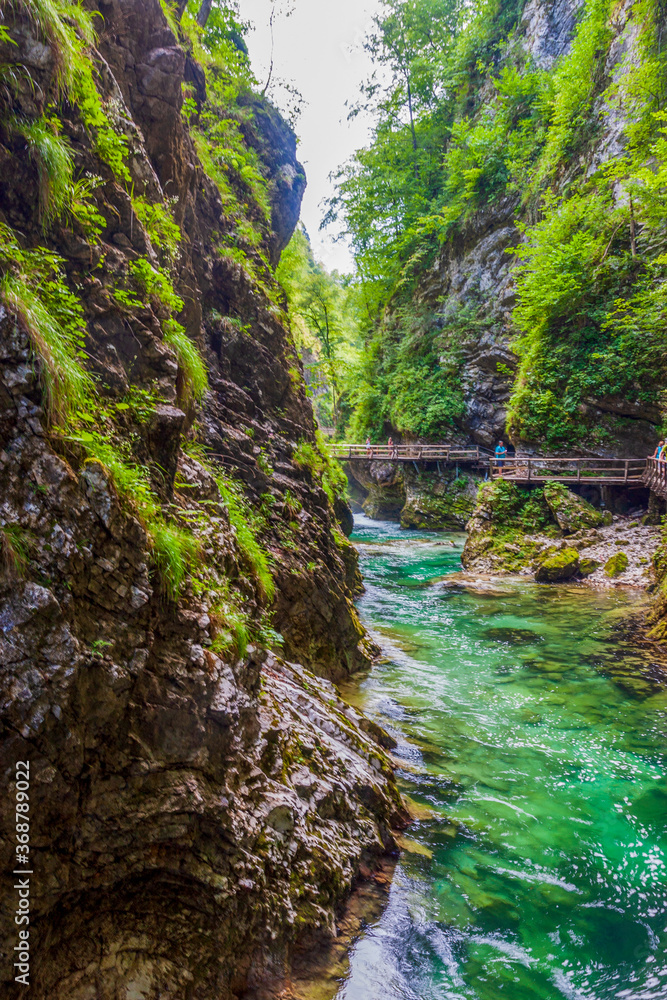 crystal clear water in a mountain river in an alpine gorge crystal clear water in a mountain river in an alpine gorge