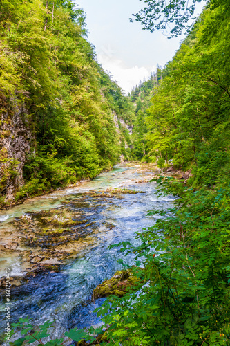 crystal clear water in a mountain river in an alpine gorge