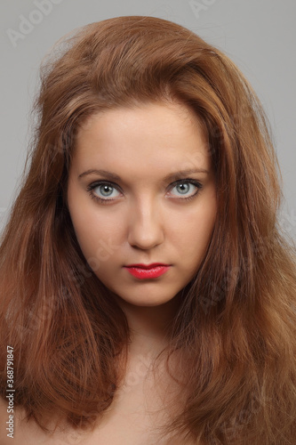young, beautiful woman with red hair