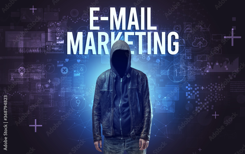 Faceless man with E-MAIL MARKETING inscription, online security concept Faceless man with E-MAIL MARKETING inscription, online security concept