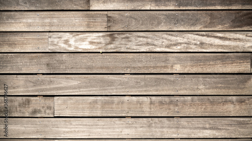  Close-up of worn brown gray wooden slats, horizontal, background