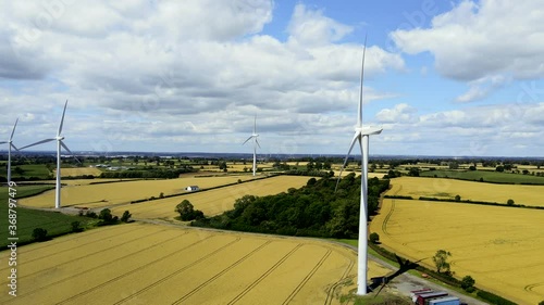Wind Turbine in the UK countryside - Tracking and rotating shot_Graded SL CLEAN KODAK C