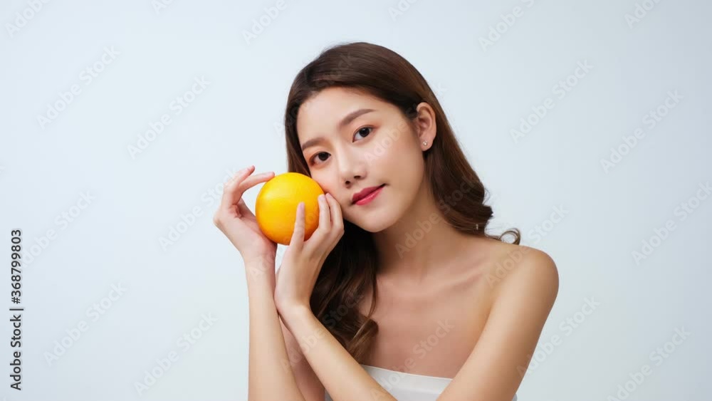 Portrait of beautiful asian woman looking to camera with attractive smile. People with beauty and skin care concept...woman smile and laugh joyfully on isolated white background.4K UHD. Portrait of beautiful asian woman looking to camera with attractive smile. People with beauty and skin care concept...woman smile and laugh joyfully on isolated white background.4K UHD.