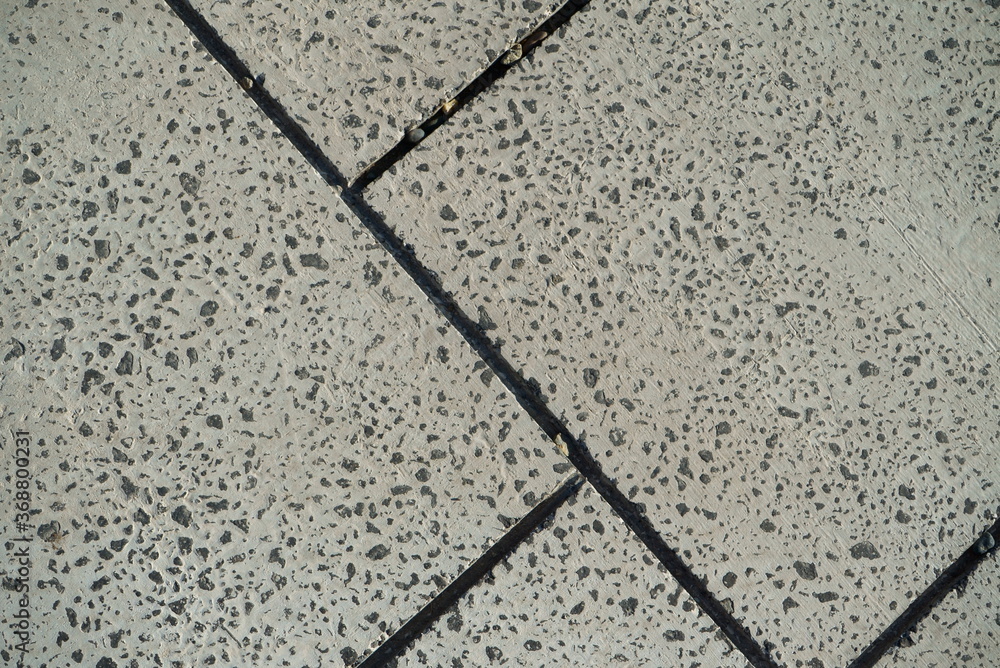 Obraz premium Sidewalk made of stone tiles