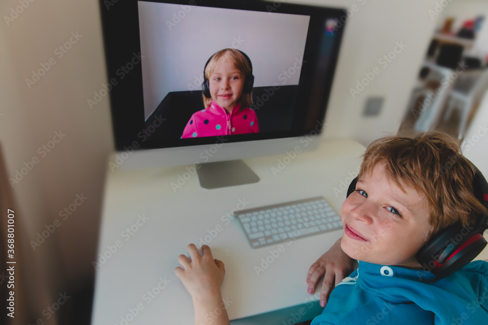 kids talking with friend through conference call, social distancing - obrazy, fototapety, plakaty 