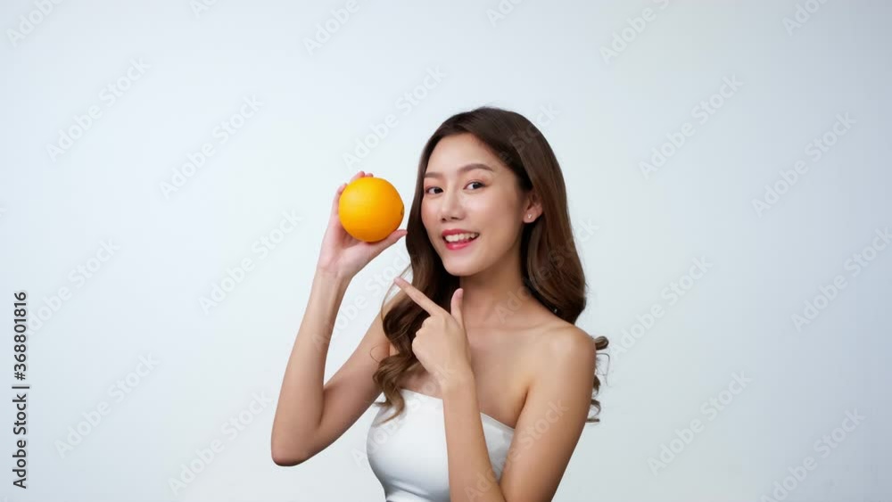 Portrait of beautiful asian woman looking to camera with attractive smile. People with beauty and skin care concept...woman smile and laugh joyfully on isolated white background.4K UHD. Portrait of beautiful asian woman looking to camera with attractive smile. People with beauty and skin care concept...woman smile and laugh joyfully on isolated white background.4K UHD.