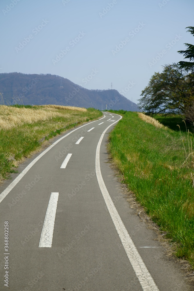 Take a walk on the embankment road on a sunny day Take a walk on the embankment road on a sunny day