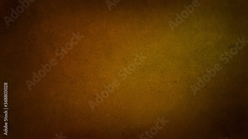 abstract orange and yellow background with dark gradient at the corners. rust and oxidized metal background. autumn and warm concept background for art work.