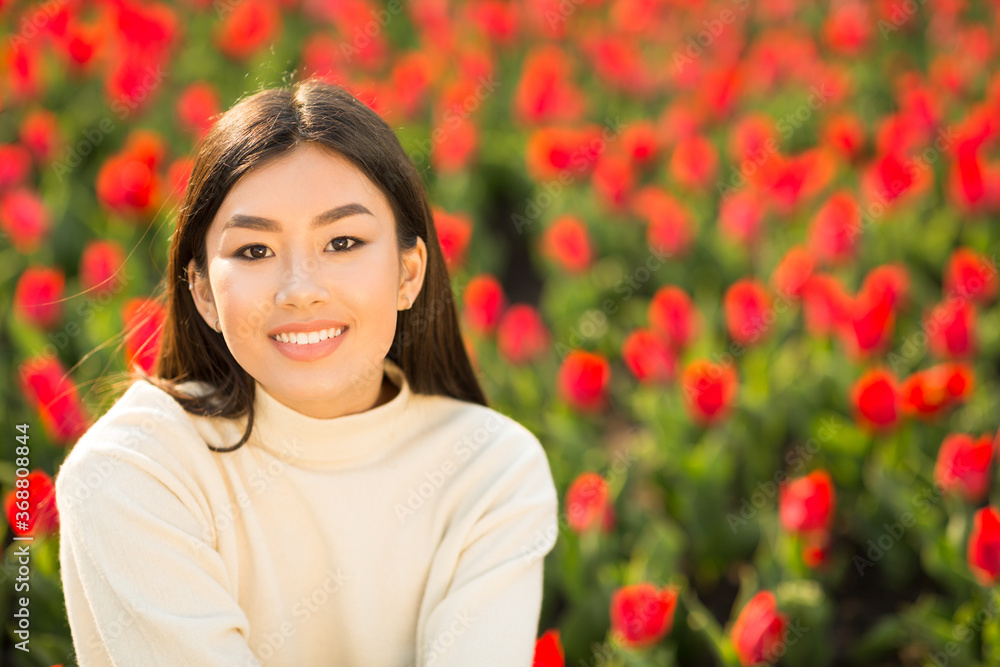 Portrait of asian girl smiling and looking at camera Portrait of asian girl smiling and looking at camera