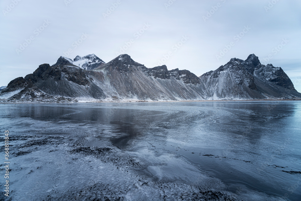 Snow cover black beach and Vesturhorn Mountain in Winter, Iceland. Snow cover black beach and Vesturhorn Mountain in Winter, Iceland.