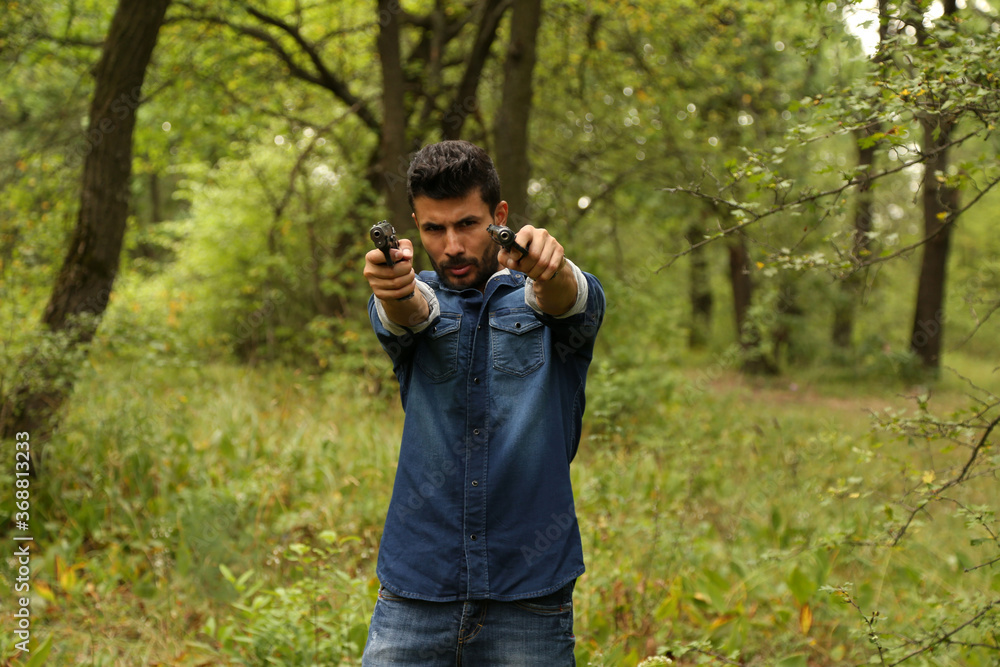Man with two pistols Man with two pistols