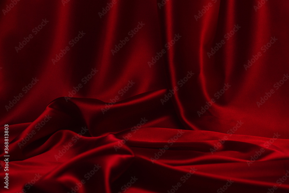 Red silk or satin luxury fabric texture can use as abstract background. Red silk or satin luxury fabric texture can use as abstract background.