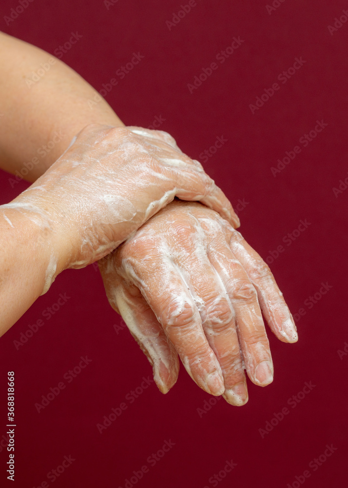 Fototapeta premium Vertical image Side view Wash your hands. Health cleanliness concept.