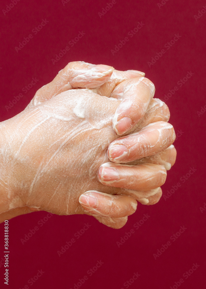 Fototapeta premium Vertical image Side view Wash your hands. Health cleanliness concept.