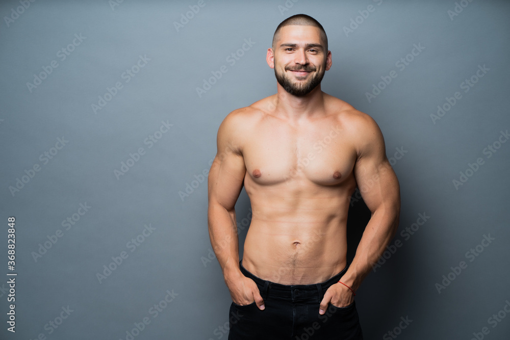 handsome muscular man with naked torso handsome muscular man with naked torso