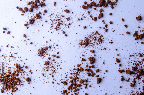 Cool loose coffee on a white background. Brewed coffee. Beautiful pattern.