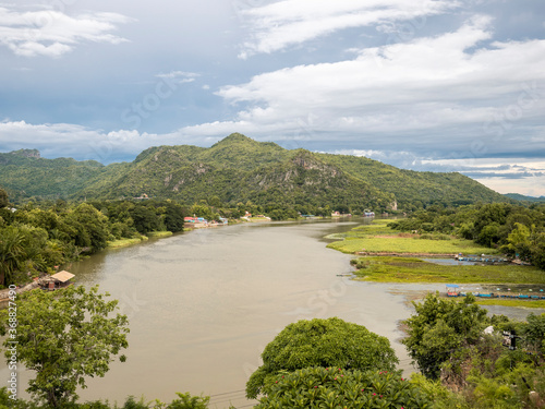 Panorama is views of the River Kwai and the mountains of Kanchanaburi Thailand.