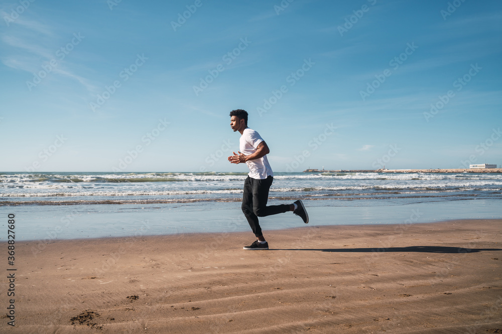 Portrait of an athletic man running. Portrait of an athletic man running.