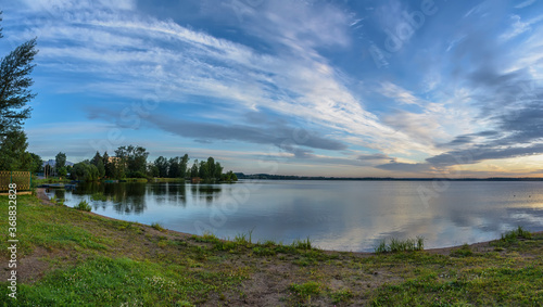 Beautiful summer sunrise on Valdai Lake in July.