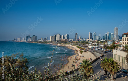 Landscape of Mediterranean sea beach and skyline of Tel Aviv. © borisbelenky