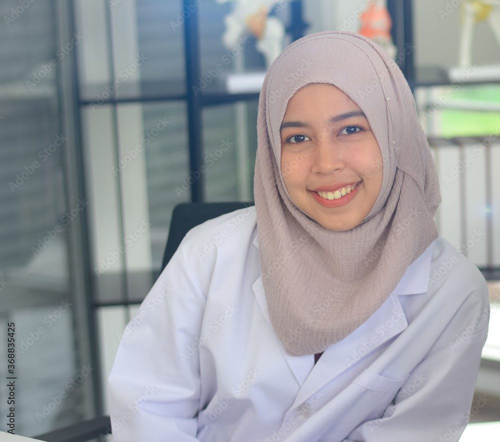portrait of a smiling woman scientist happiness in a laboratory portrait of a smiling woman scientist happiness in a laboratory