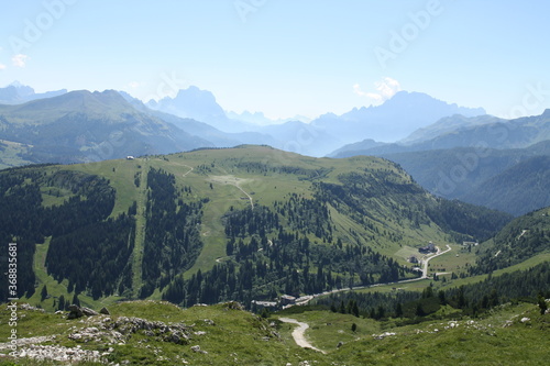 panoramic view of the meadows and mountains of the sella group in alta badia