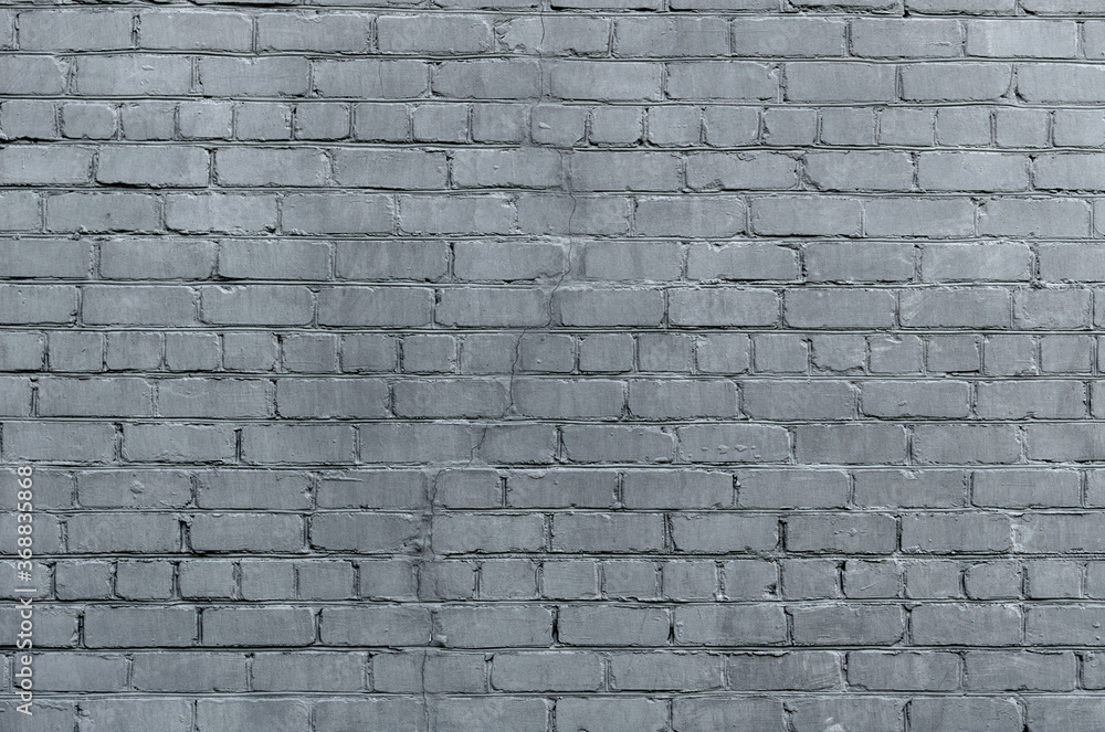 Obraz premium Background and texture of old rough gray brick wall