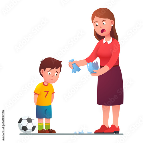 Angry mother scolding son kid for breaking vase