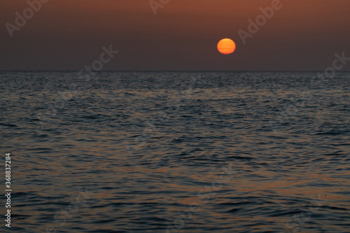 Fototapeta Naklejka Na Ścianę i Meble -  Sunset on the El Palmar beach in Vejer de la Frontera. Cadiz Andalusia. Spain