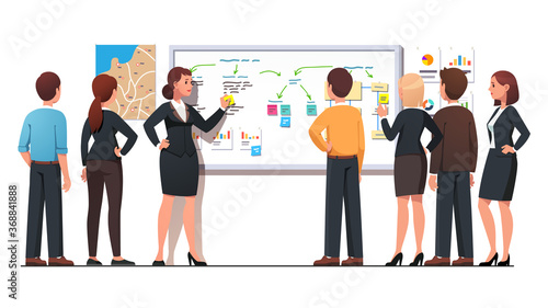 Boss woman explaining business to employees group