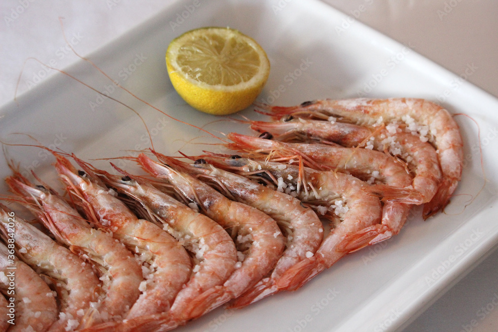 Plate of grilled prawns with salt Plate of grilled prawns with salt
