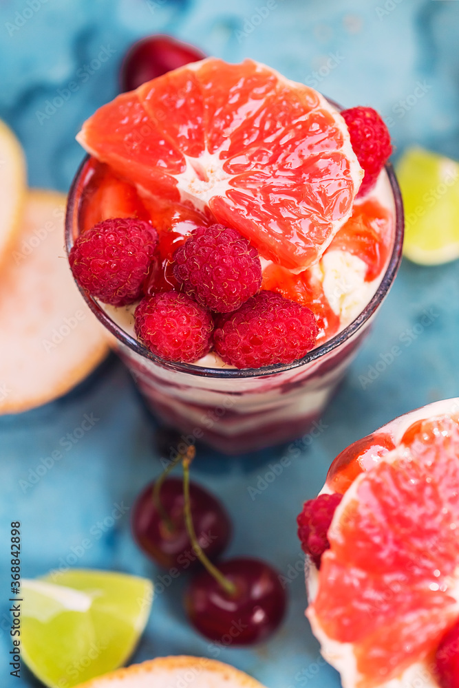Dessert with berry, raspberry, ice cream and grapefruit Dessert with berry, raspberry, ice cream and grapefruit