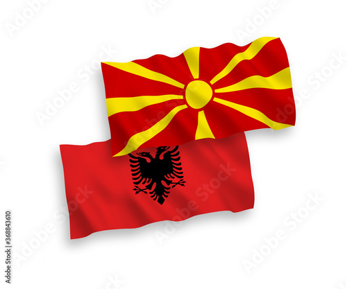 Flags of Albania and North Macedonia on a white background