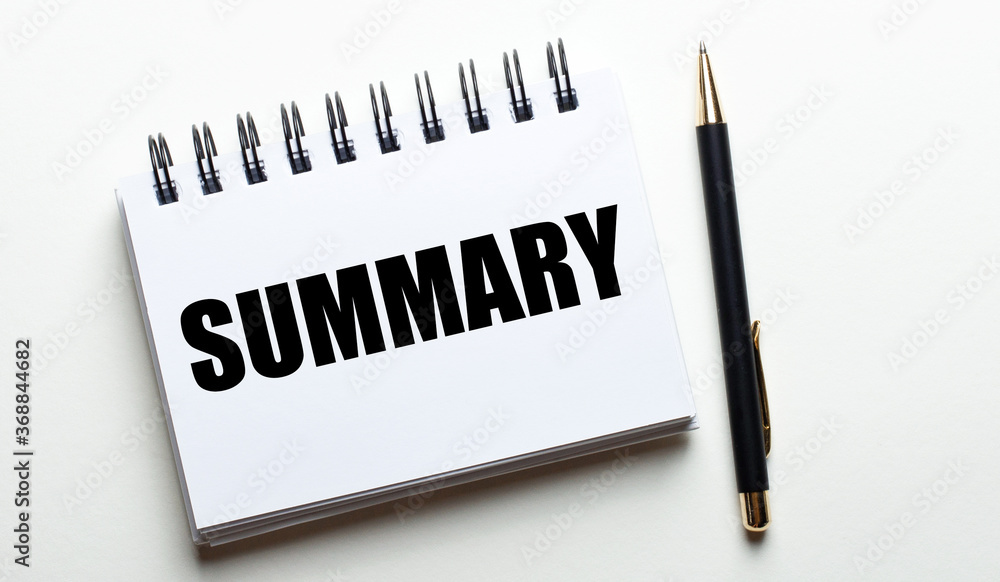 The word SUMMARY is written in a white notebook near a black pen on a white background. Business concept The word SUMMARY is written in a white notebook near a black pen on a white background. Business concept