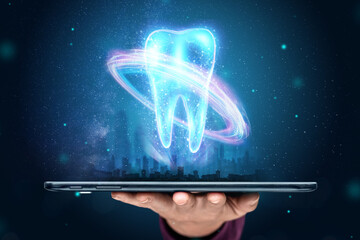 Image of a neon hologram tooth. Medicine concept, new technologies, oral care, dental prosthetics, copy space.