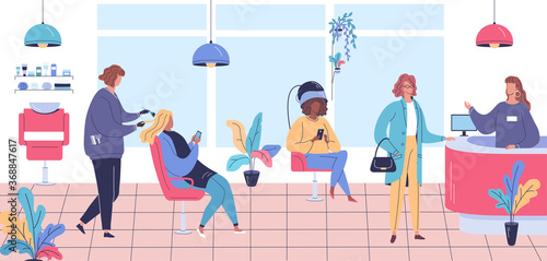 Different women spend time in a modern hairdressers