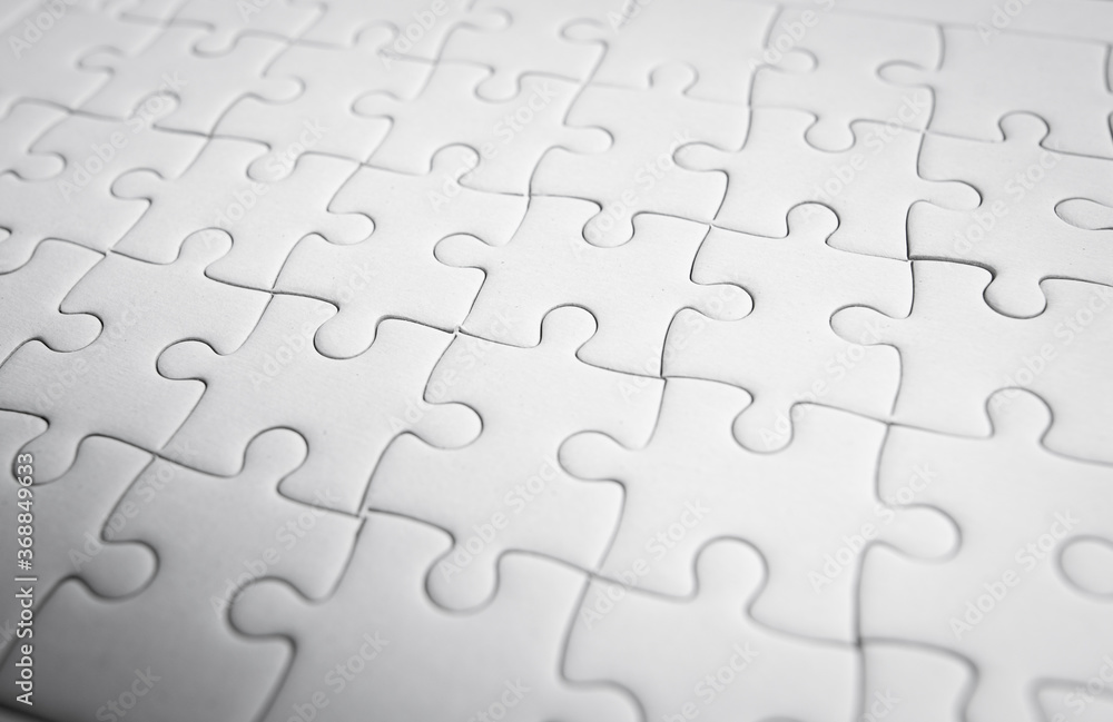 White jigsaw puzzle pattern background. White jigsaw puzzle pattern background.