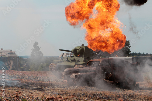 The military destroyed an enemy tank. Tank is on fire.