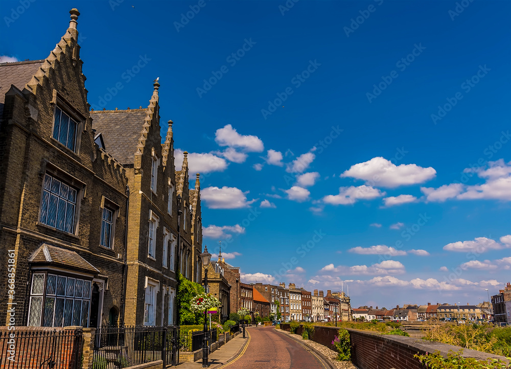 Imposing Georgian buildings on the North Brink beside the River Nene in Wisbech, Cambridgeshire in the summertime