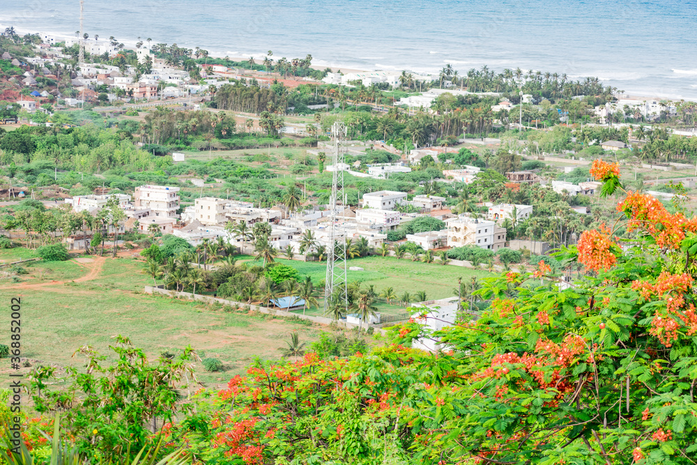 Obraz premium city top view near sea shore from top of a hills looking awesome in sunny day. 