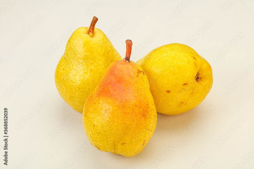 Fresh sweet pear over background