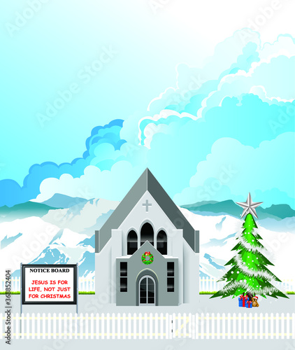 Christian parish church with Jesus is for life not just for Christmas message on notice board set against a blue cloudy sky