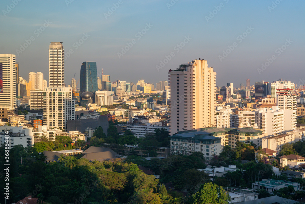 Bangkok Thailand skyline aerial view from upper floor of hotel downtown apartment buildings and skyscrapers