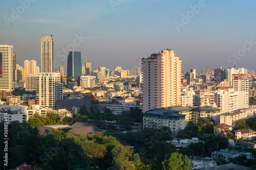 Bangkok Thailand skyline aerial view from upper floor of hotel downtown apartment buildings and skyscrapers