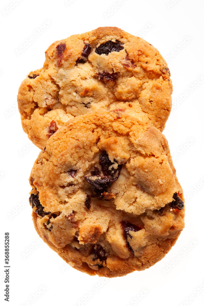 Butter biscuits with dried berries isolated on white background. Butter cookies for Christmas and other celebrations Butter biscuits with dried berries isolated on white background. Butter cookies for Christmas and other celebrations