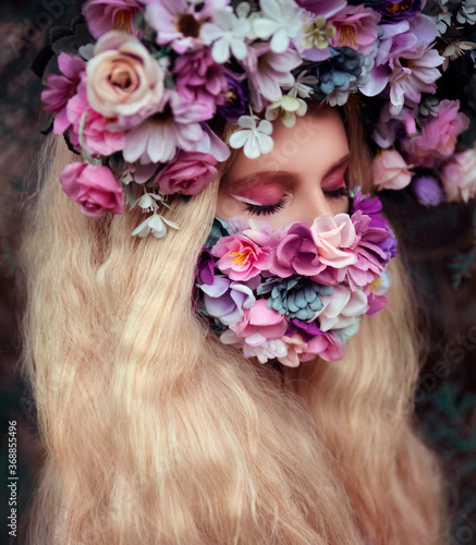 Woman wearing face mask decorated with flowers