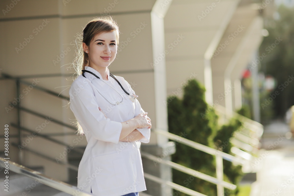 Portrait of a beautiful female doctor or nurse. Health concept. Portrait of a beautiful female doctor or nurse. Health concept.