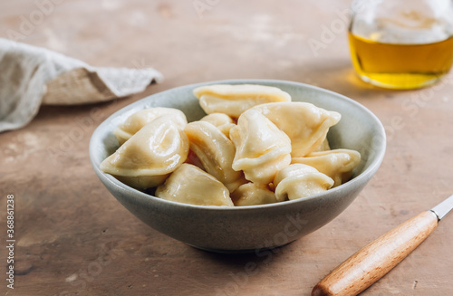 Russian, Ukrainian or Polish dish - varenyky. Dumplings, filled with cottage cheese.