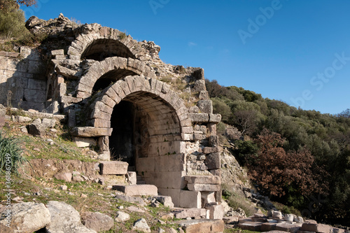 The theater building on aigai ancient city of aeolis at Manisa / Turkey photo